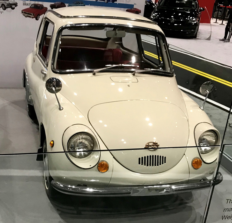 This might have been my favorite thing. Subaru had a timeline showing their most unique models, from the 360 to the Brat to the BRZ, and brought a lovely (much the same color scheme as the Countach, actually) 360.